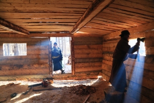 I participated with a mentor in the construction of his family’s first winter cabin, from the fetching of logs to the stuffing of insulation. The entire cabin was built with axes, handsaws, chainsaws, a home-made charcoal chalk-line and, rarely, with rope, a pencil and a banged up level.